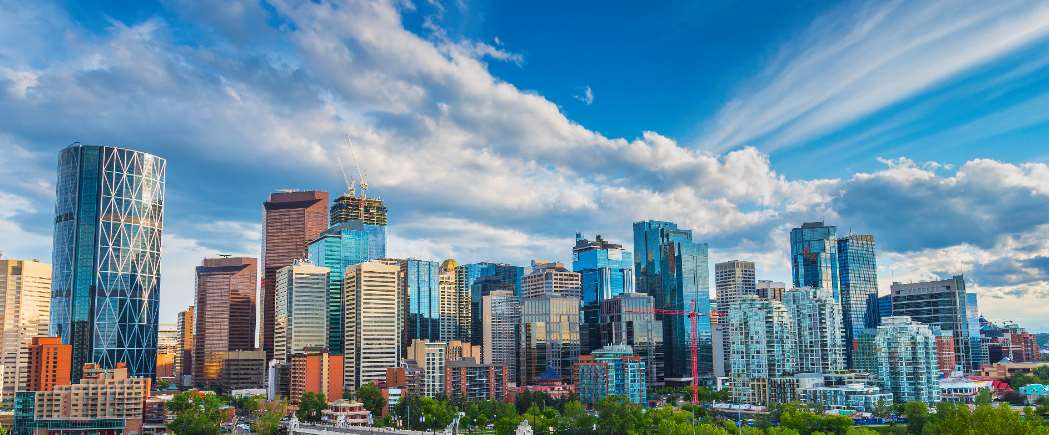 Calgary skyline wth wind swept clouds