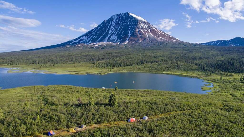 looking at a amountain in the Nortwest Territories Canada with tents pitched in the foreground